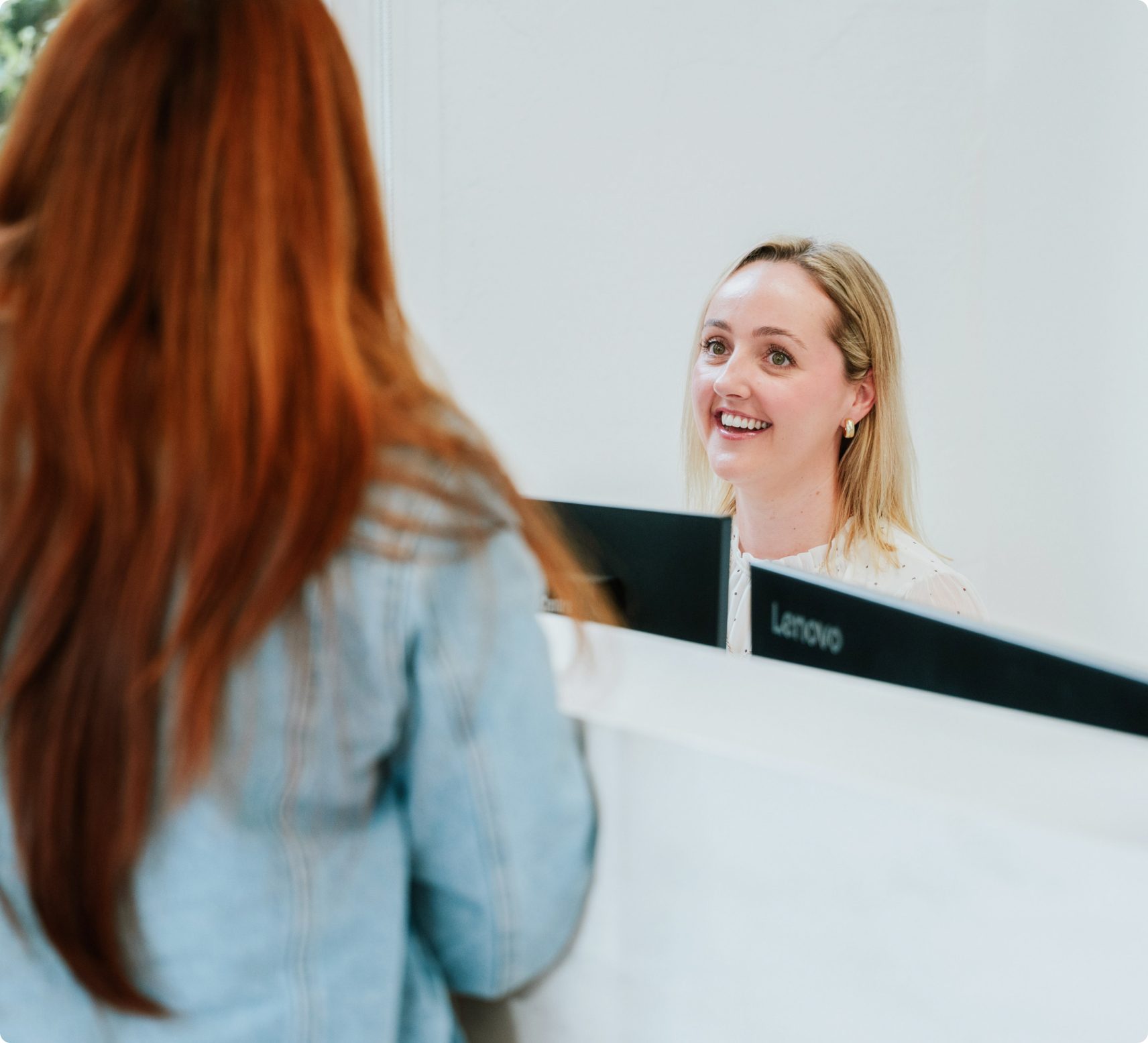 Patient chatting with reception at Auckland City Orthodontics